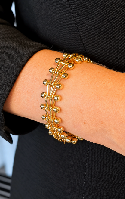 Pulseira Feminina Dourada Statement com Hastes e Esferas